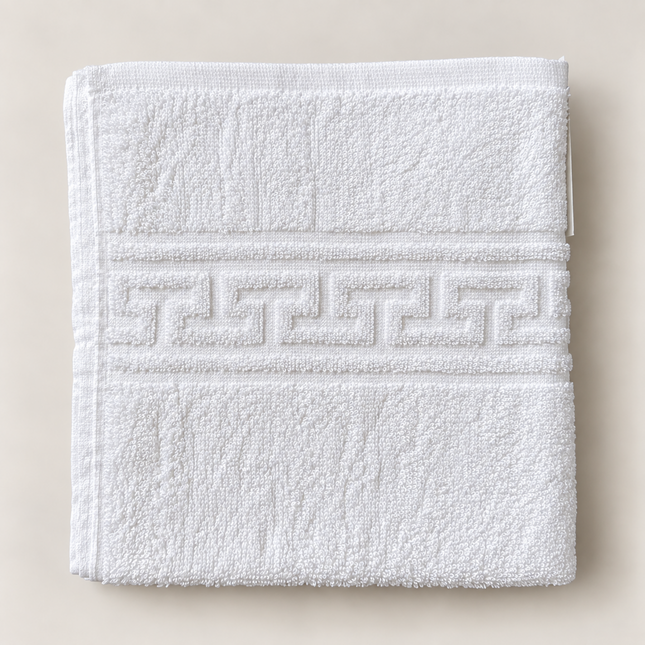 Prosop alb Madhome.ro din bumbac 100%, 50x80 cm, cu densitate de 500 gsm și bordură grecească elegantă