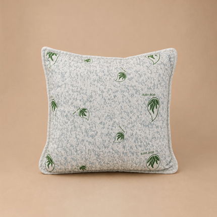 Madhome.ro square Aloe Vera pillow with a quilted white cover featuring green leaf patterns on a beige background.