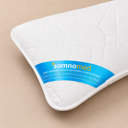 Madhome.ro white quilted antimicrobial pillow with Somnomed label, 50x70cm size, made of soft polyester microfiber.