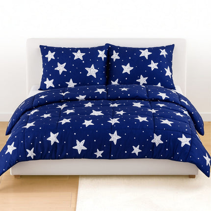 Madhome.ro quilted bedding set with blue duvet and two pillows featuring a white star pattern on a bed
