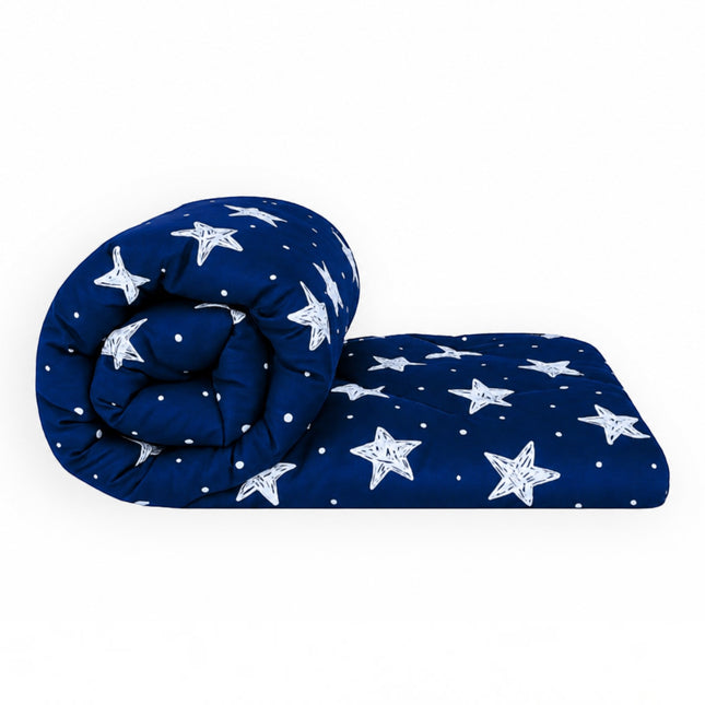 Madhome.ro quilted duvet with a deep blue background and white star pattern, rolled up for storage.