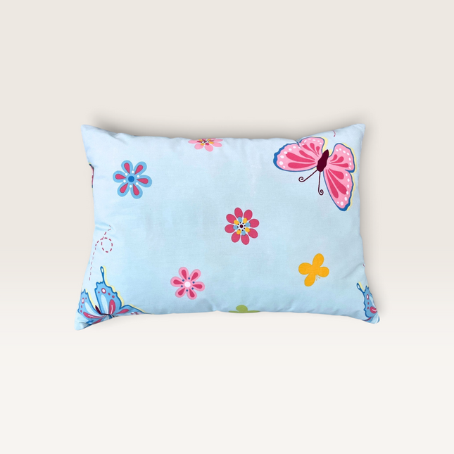 Madhome.ro cotton children's pillow featuring a light blue background with colorful butterfly and flower patterns.