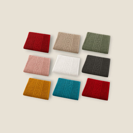 Madhome.ro collection of 100% cotton hotel-quality towels in various colors featuring a classic Greek border design.
