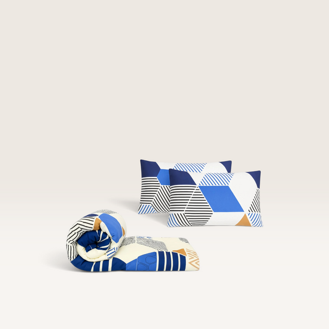 Madhome.ro quilted duvet and two pillows set in sapphire blue with a modern geometric pattern on soft microfiber.
