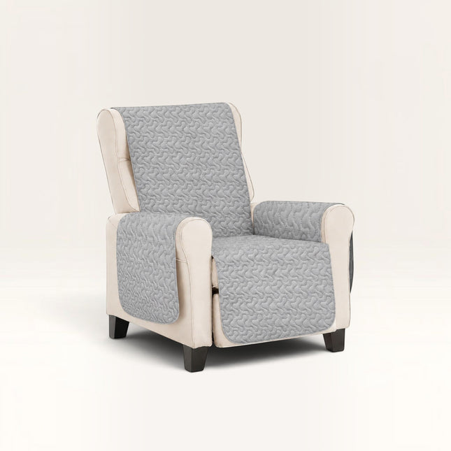 Madhome.ro grey quilted armchair cover with a textured pattern, protecting the seat, backrest, and armrests.
