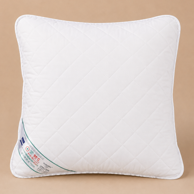 Madhome.ro HypoallergenicMed white quilted pillow with diamond pattern, washable at 95°C for maximum hygiene.