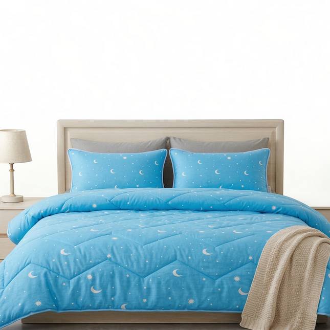 Madhome.ro light blue quilted bedding set with moon and star pattern, including a duvet and two matching pillows.