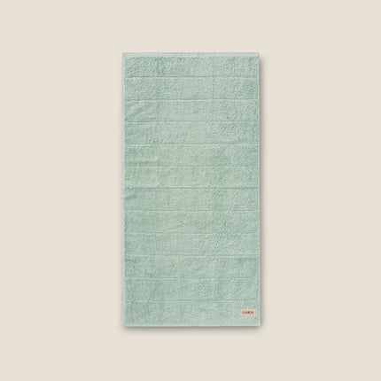 Madhome.ro soft light green cotton bath towel with a dense texture and reinforced hem for high absorbency