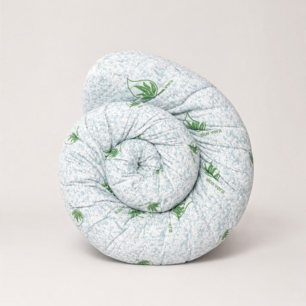 Madhome.ro 5cm memory foam mattress topper rolled up with white and green Aloe Vera patterned fabric cover