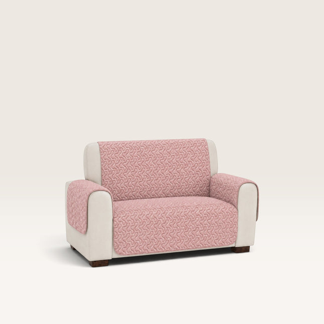 Madhome.ro pink quilted sofa cover for a 2-seater couch, featuring a soft microfiber texture and protective design.