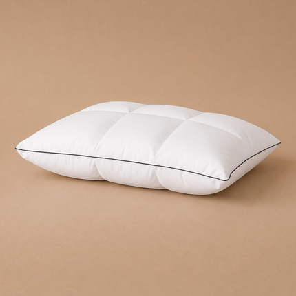 Madhome.ro premium white goose down pillow with 100% cotton downproof cover and black piping detail on beige background