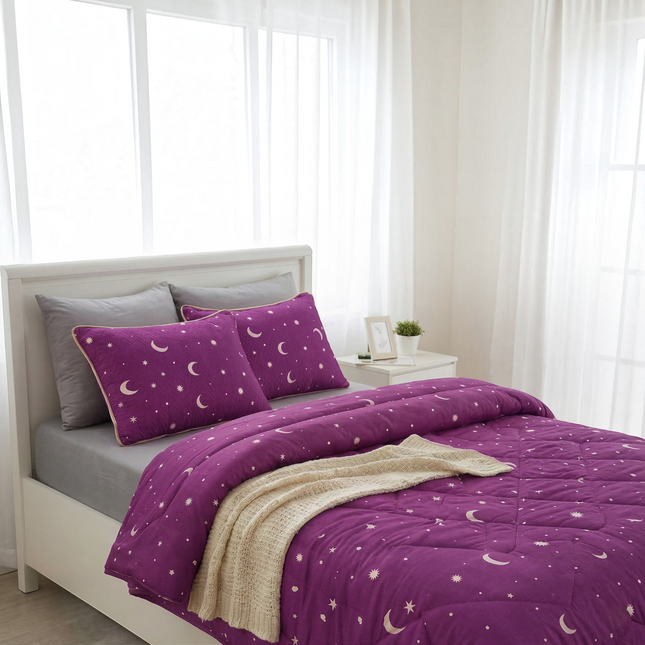 Madhome.ro purple quilted bedding set with moon and star print, including a duvet and two pillows on a white bed.