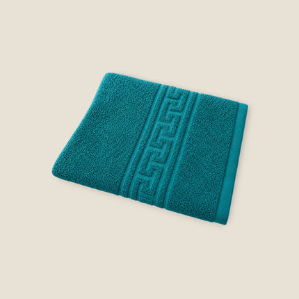 Madhome.ro turquoise cotton bath towel with a textured Greek key border design, 500 gsm hotel quality.