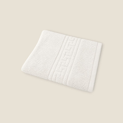 Madhome.ro white cotton hotel-quality towel featuring a classic Greek key border design and durable double stitching.