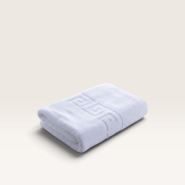 Madhome.ro white cotton hotel towel featuring an elegant embossed Greek key border pattern