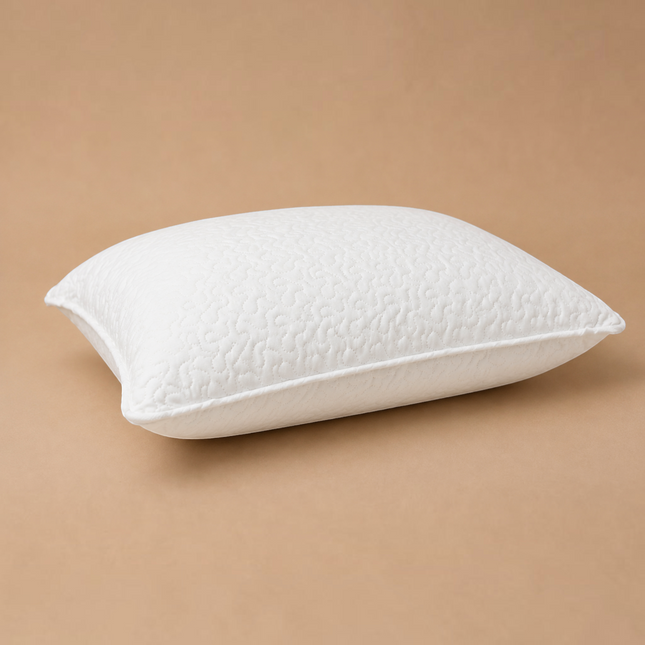 Madhome.ro white quilted microfiber pillow with silicone down filling and reinforced edges on a beige background
